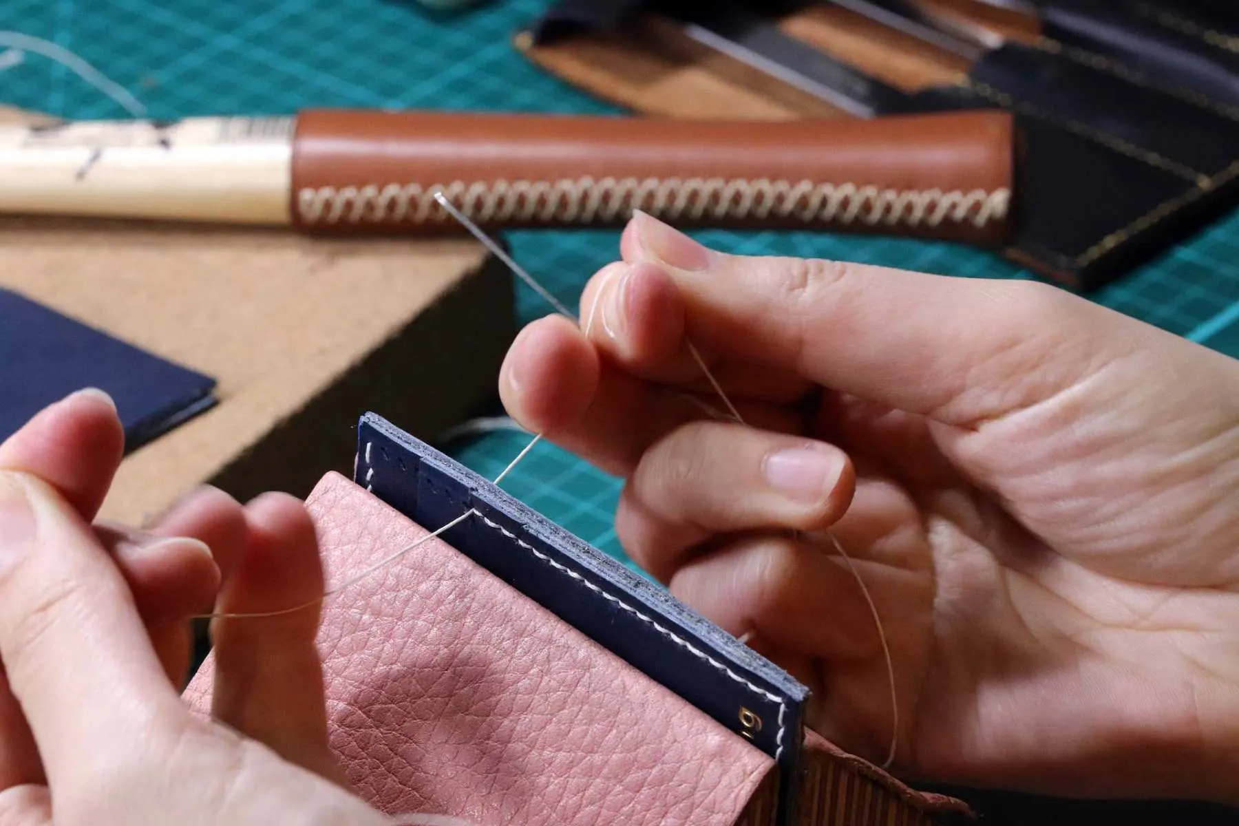 Hand stitching leather by hand at the Leathermend workshop Shibden Halifax
