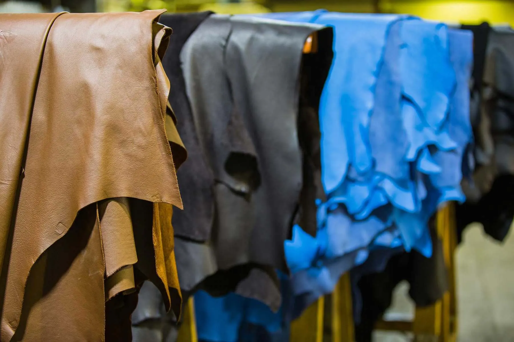 Coloured leather hides ready for repair and recolouring, Leathermend